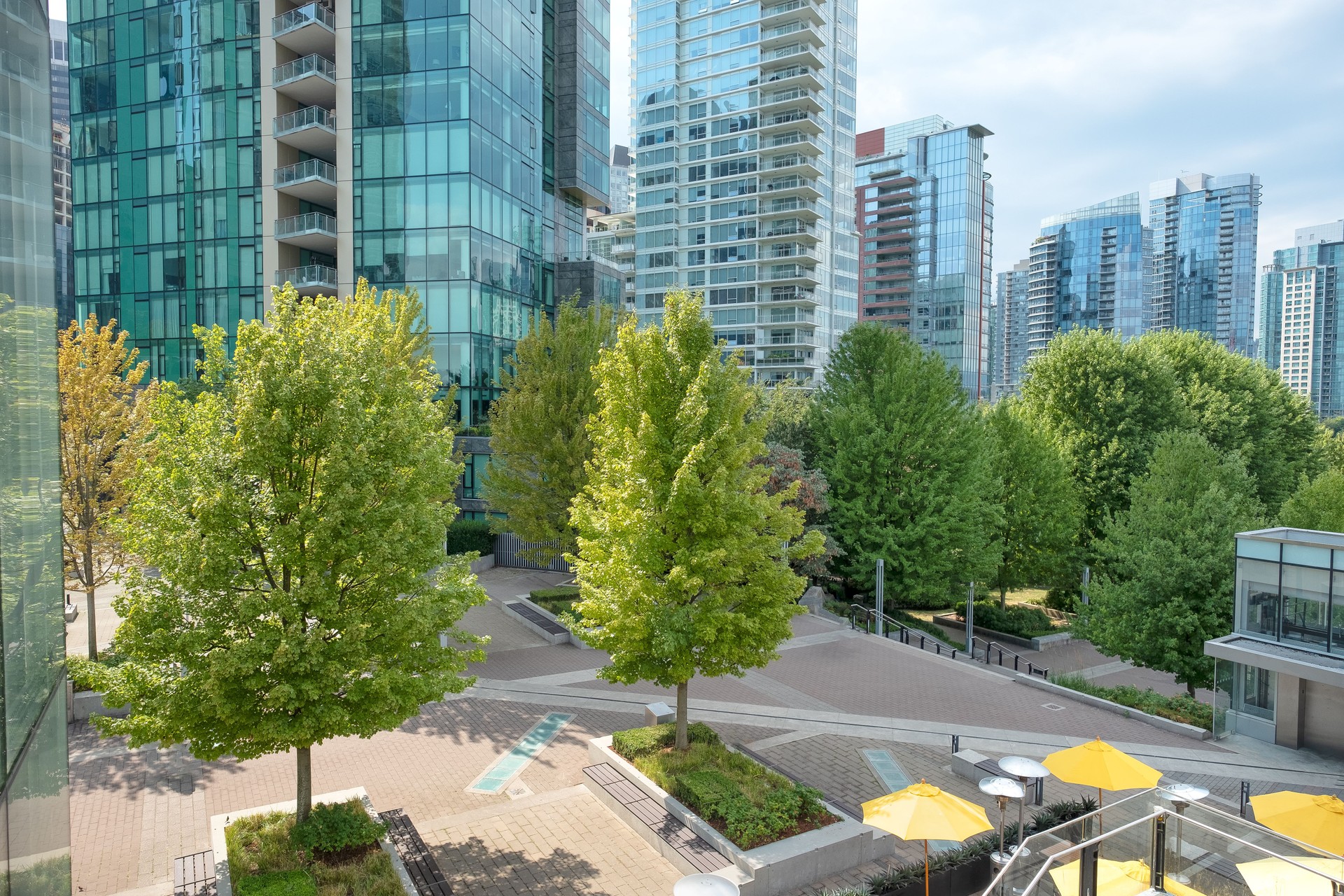 Sustainable Landscape Design, Restaurant and Public Park Bordering Downtown Towers